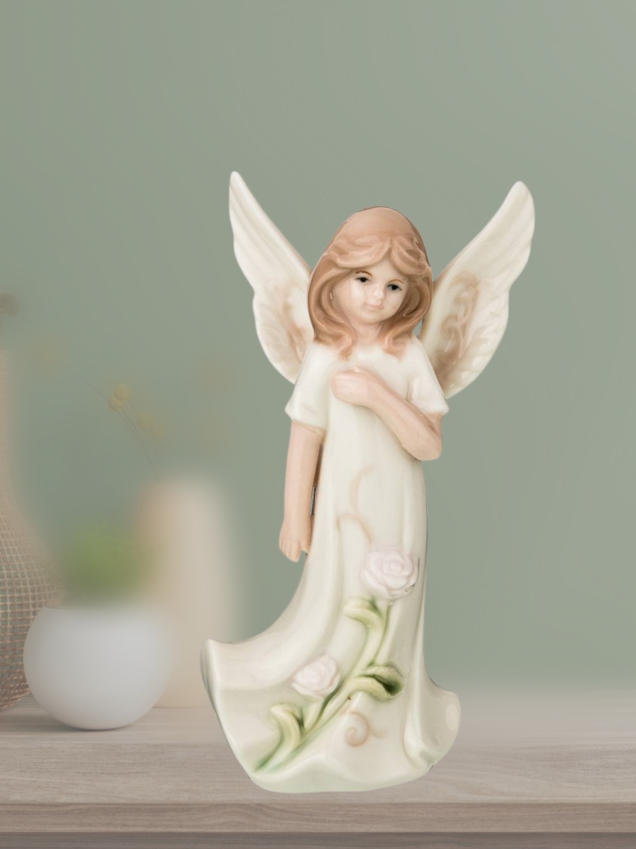 Фото по запросу Маленькая статуэтка ангела